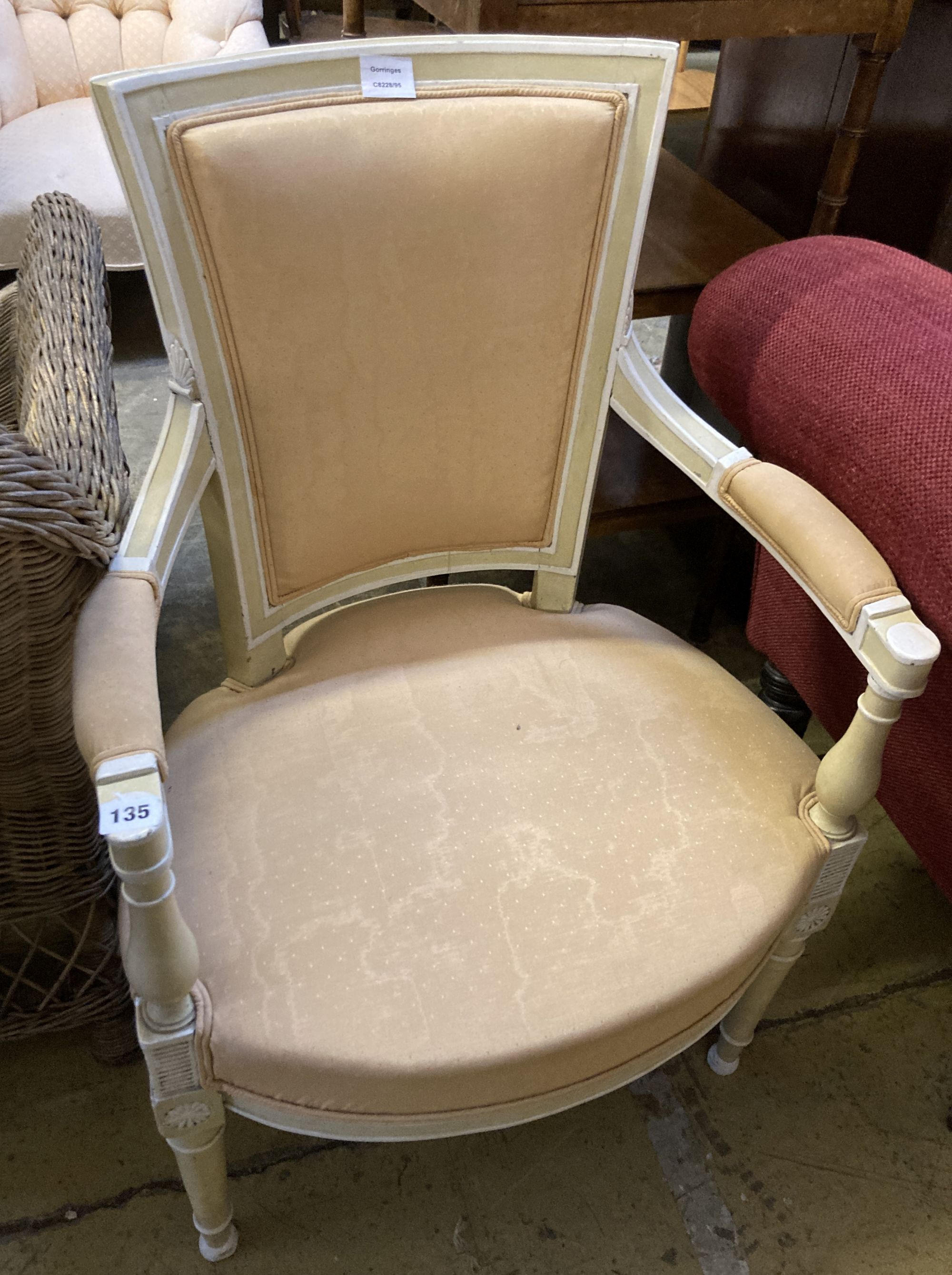A Louis XVI style cream and white painted fauteuil, width 56cm, depth 48cm, height 88cm
